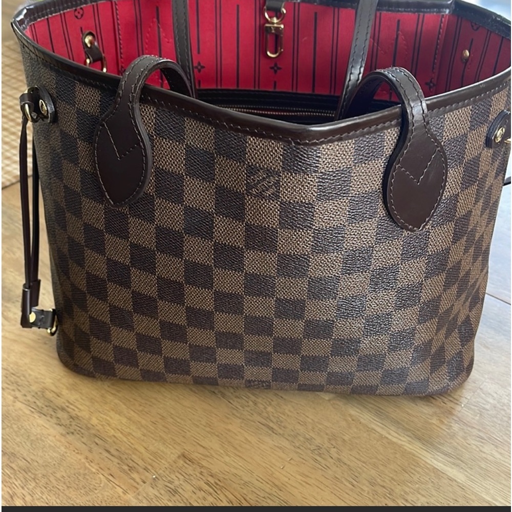 MM Neverfull …. Selling as I have purchased another!  Loved this bag!!!